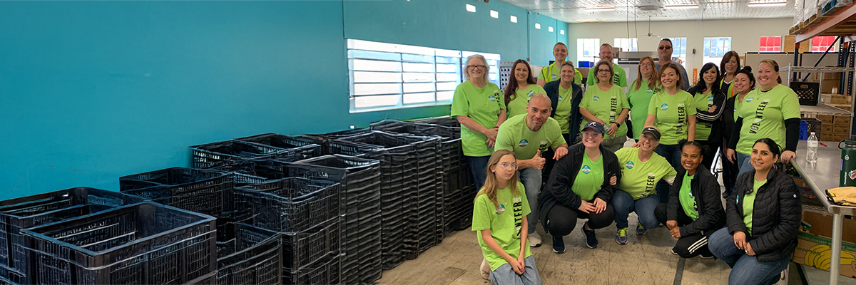 group of volunteers posing for a group photo