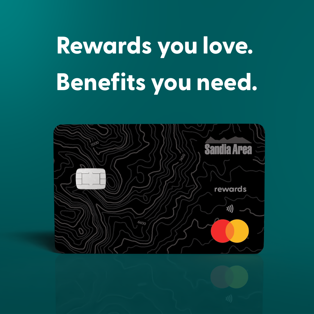 black credit card with white text above that says "Rewards you love. Benefits you need."